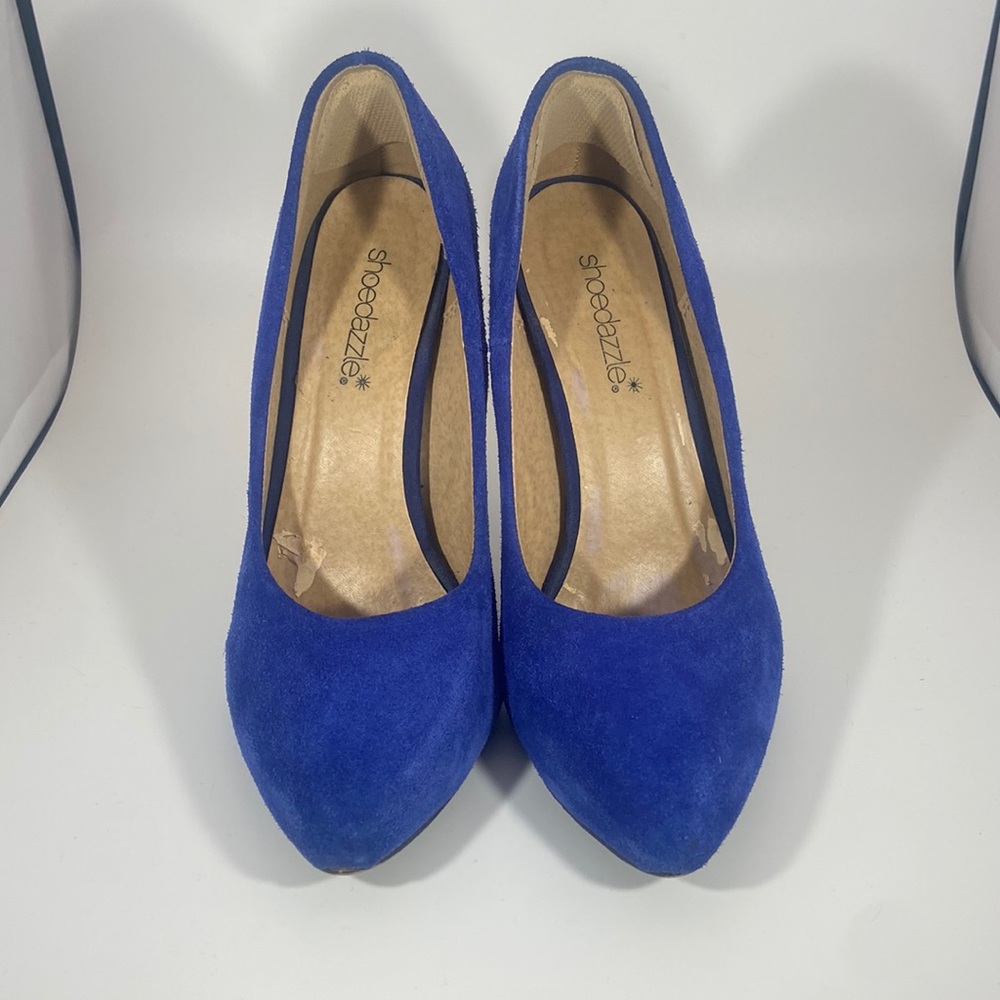 Blue Faux suede pumps.